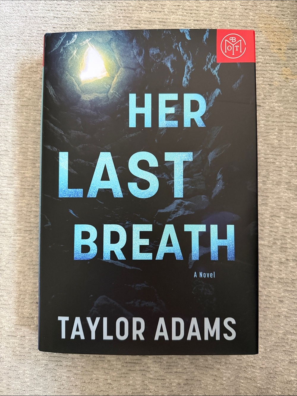 Her Last Breath by Taylor Adams - Black & Teal Hardcover